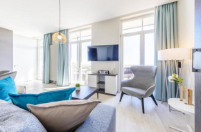 Große Welle - Moderne 2,5-Zimmer Ferienwohnung mit Südbalkon und Boddenblick in Wustrow